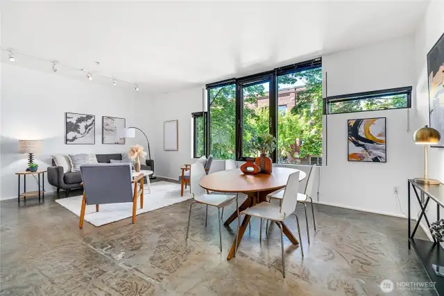 Spacious, bright and airy with 9' ceilings, this modern Capitol Hill condo provides an in-city retreat with large windows and aesthetically pleasing concrete floor.