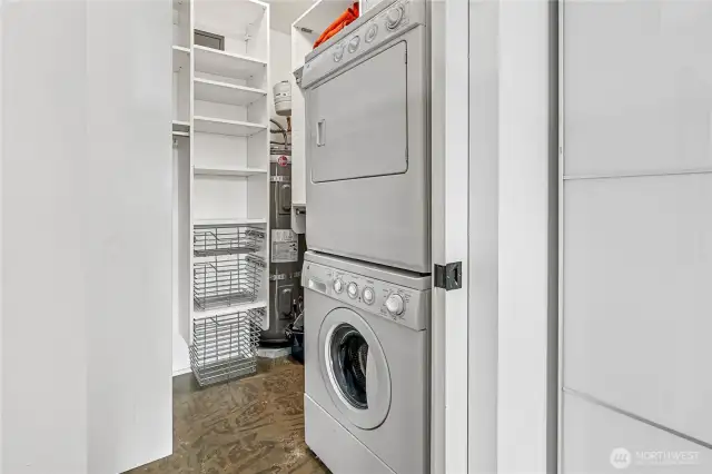 The walk-in closet has lots of room and full size washer and dryer.