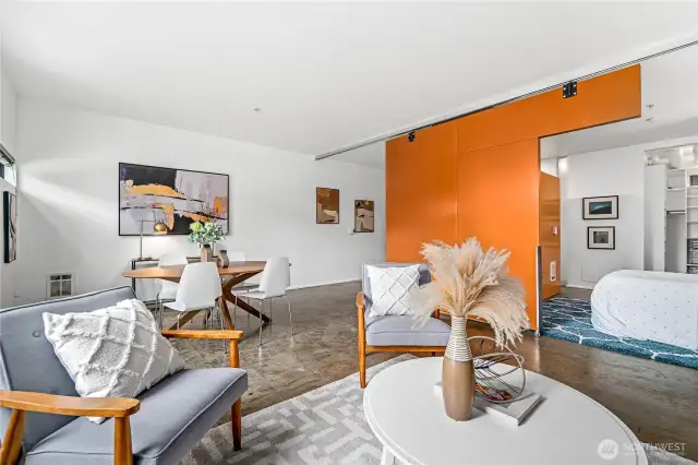 The open layout plan with a movable jigsaw puzzle wall is perfect for living and entertaining.