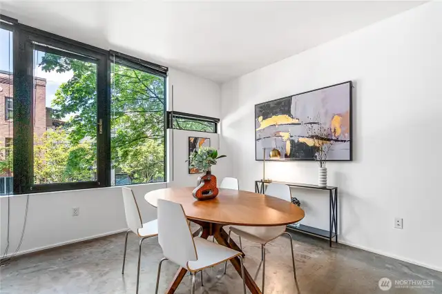 Spacious, bright and airy, this modern Capitol Hill condo provides an in-city retreat with large windows and aesthetically pleasing concrete floor.