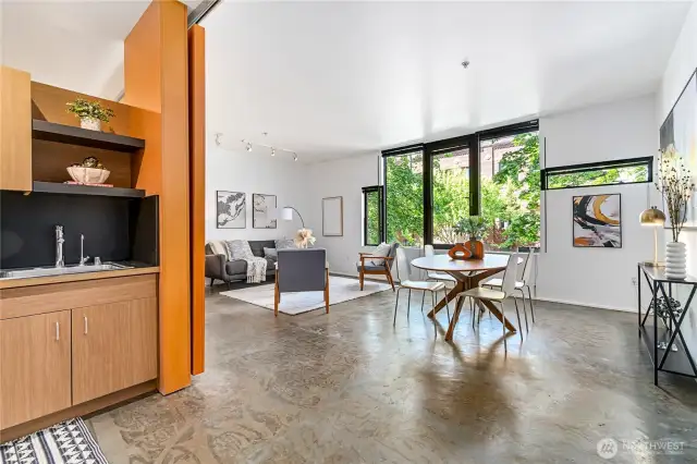 The open layout plan with a movable jigsaw puzzle wall is perfect for living and entertaining.
