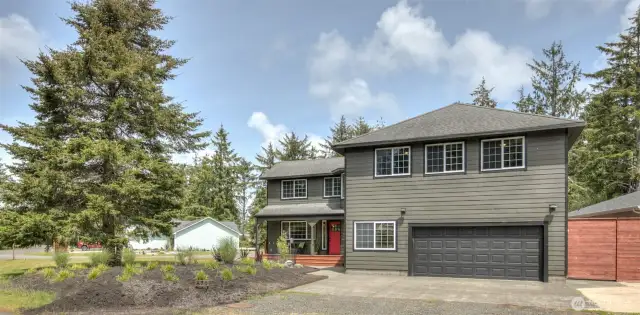 Gorgeous 2595 sq ft home on corner lot. Professionally landscaped by Coastal Yard Design