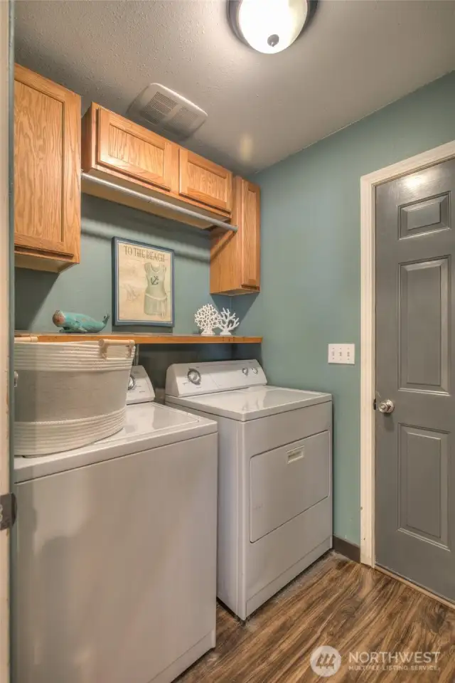 Nice size laundry room. Door leads out to oversized 2 car garage