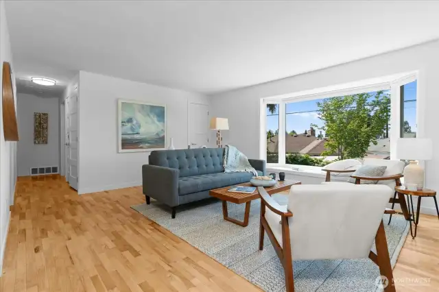 Beautiful hardwood floors extend from great room to hallway and into bedrooms