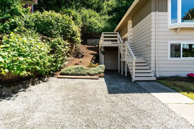 Two additional parking spaces to left of deck   are a rare find in the beach front community of Alki