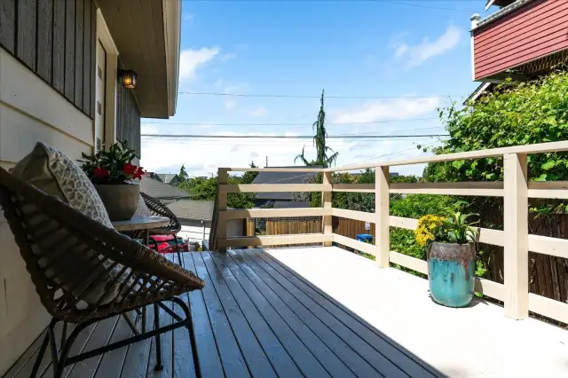 A cozy deck to unwind, the front porch provides pleasant neighborhood views