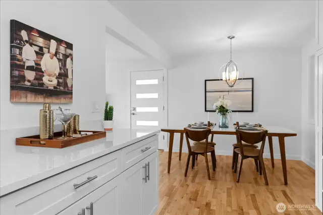 Kitchen and dining area adjacent, creating ease of flow while entertaining