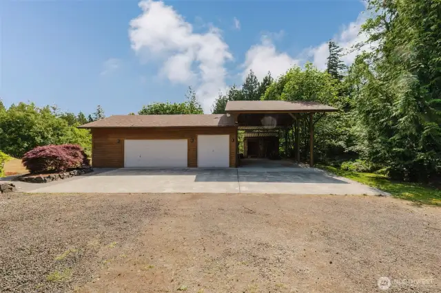 This 864-square-foot, 3-car detached garage provides versatile space for vehicles, hobbies, or storage. It includes covered RV parking and offers easy access and organization for tools or workshops, enhancing property value and functionality.