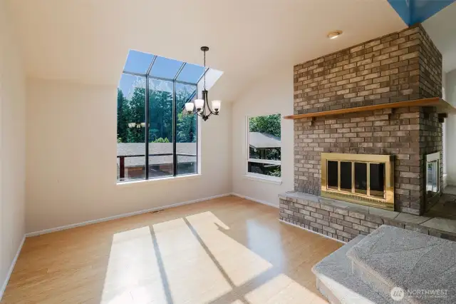 Another view of dining room with double sided fireplace.