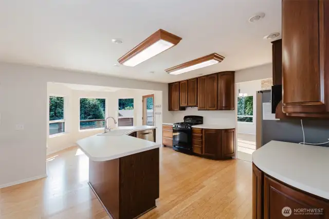 Looking towards your spacious kitchen with a all-natural lighting breakfast nook