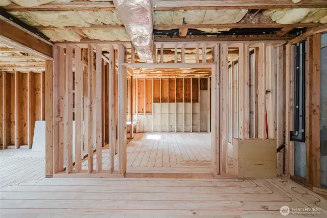 Transform this versatile space into your dream area! Whether you're envisioning a private flex room, den, crafting nook, hobby space, gaming zone, sound studio, or a peaceful retreat for guests—this room offers endless possibilities.    The bulk of the work has already been done, including heated flooring installation and a new boiler. The space is fully insulated, with plumbing for a kitchen and bath, and electrical wiring ready for your specifications. This is your opportunity to create a functional and stylish area tailored to your needs and lifestyle.