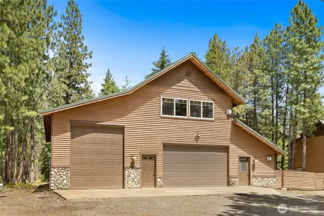 2 bed 2 bath carriage house with a huge 45' deep shop