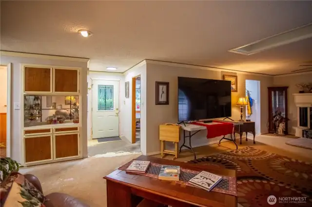 Foyer to living room or to kitchen. Built in cabinets