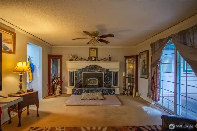 Custom built slate fireplace surround and mantle. Rope lighting above the crown molding.