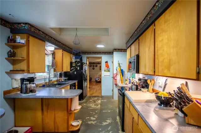 lots of custom cabinets microwave over glass top stove