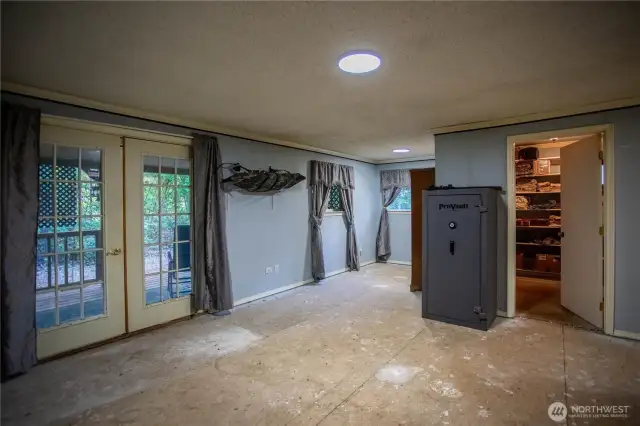 large main bedroom walk in closet in need of flooring and wall heater needs replacing