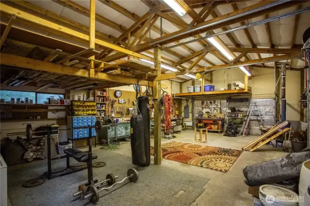 sturdy workbench, another garage door on the end, insulated
