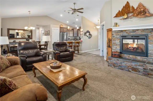 Living Room and Dining Room offer vaulted ceilings.