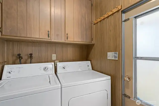 Home has a separate laundry room with access to the backyard