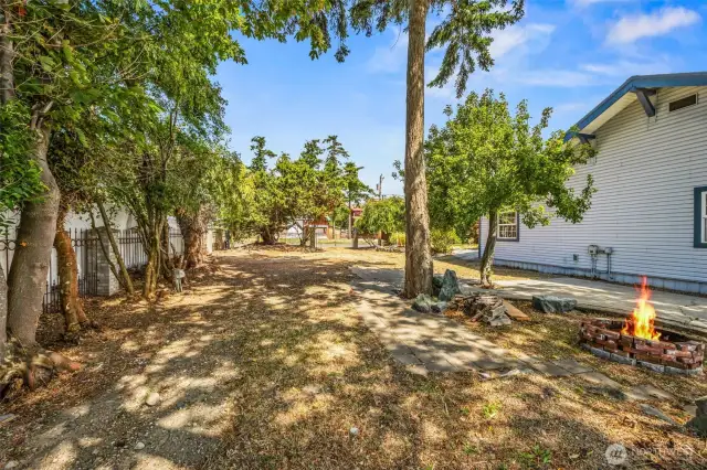 West side entry welcomes you through the gated drive, where two full RV hookups await complete with power, water, and septic. Perfect for guests or extended stays, this unique setup blends comfort and convenience in a truly one-of-a-kind waterfront setting.