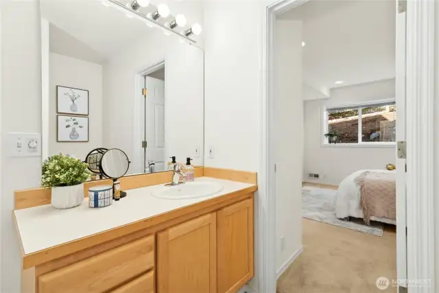 jack and jill bathroom opens to bedroom and main living space