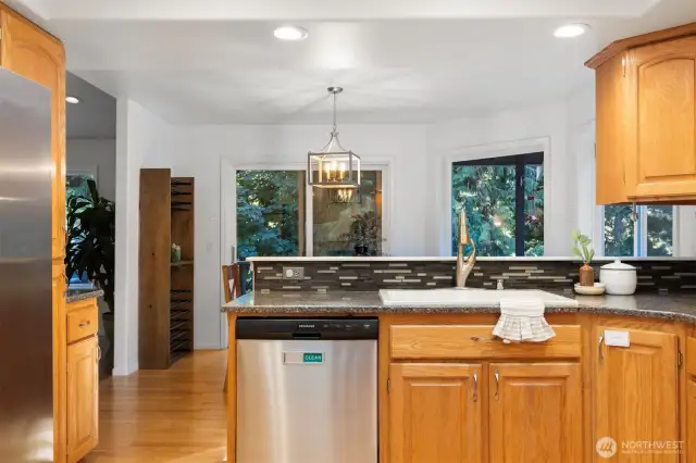 Granite counter tops and views of the lush green from every window.