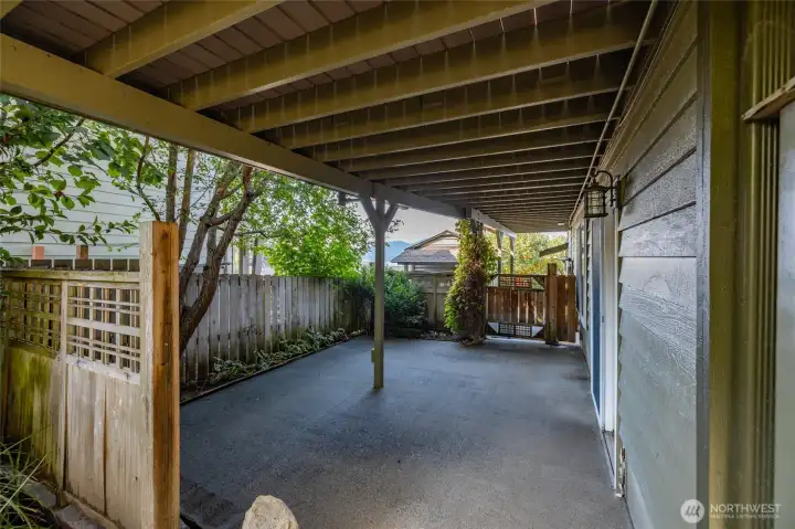 Lower covered patio perfect for seasonal storage.