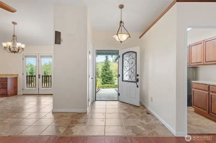 Welcoming front entry with concrete ramp for effortless accessibility.