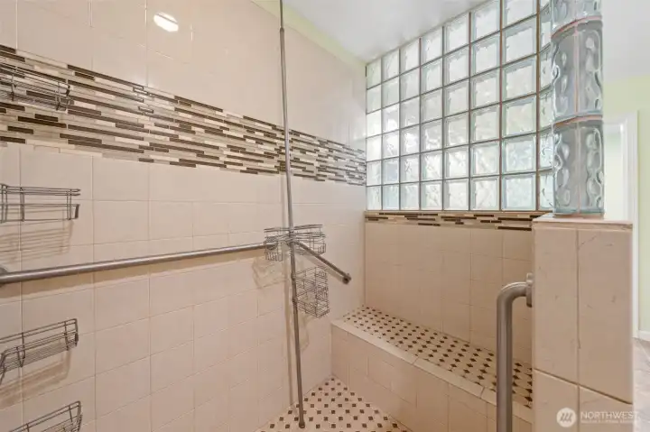 Built-in shower bench adds ease and luxury to daily living.