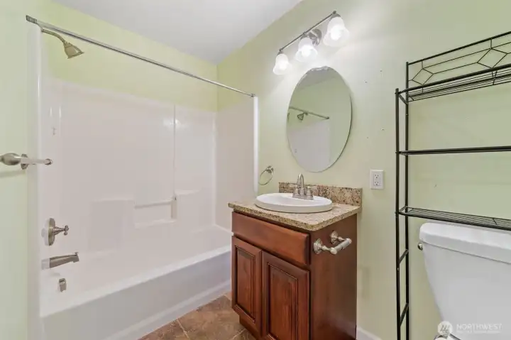 Well-appointed shared bath for guests or family.