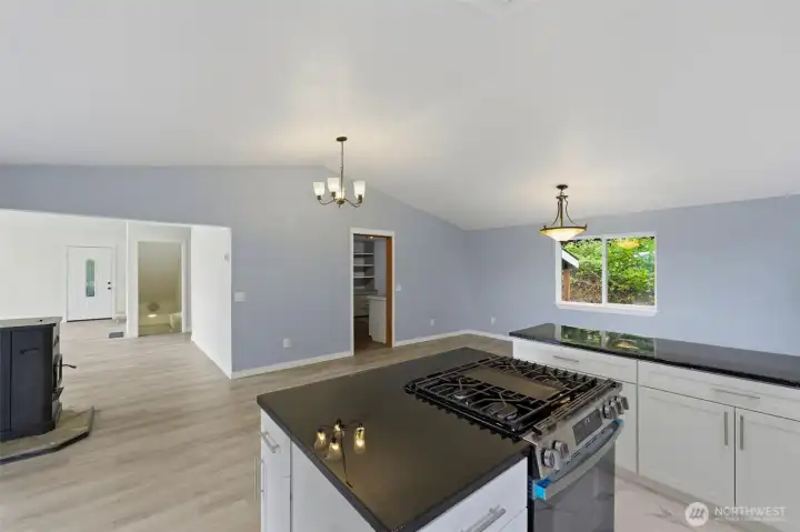 Main house kitchen back toward living room and entry