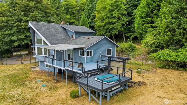 Aerial view of the various decks and expansive property