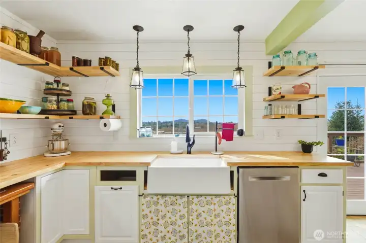 Washing the dishes isn't so bad when you can watch the horses as they frolic in the pasture!