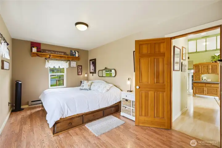 Main floor Primary bedroom suite.