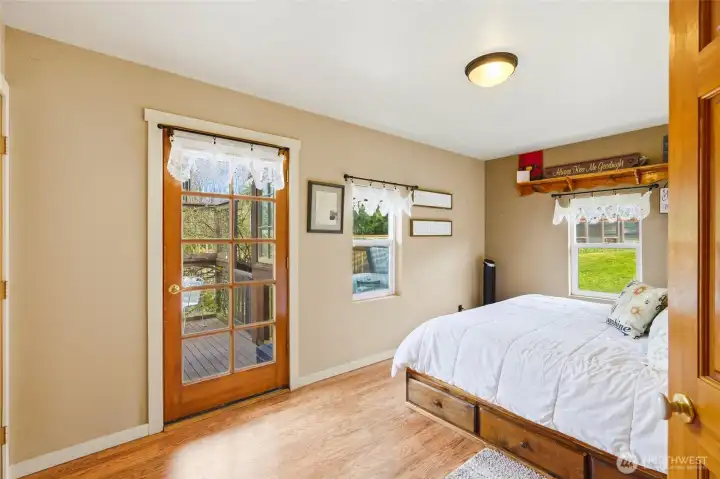 Step outside the Primary bedroom to the private part of the deck.