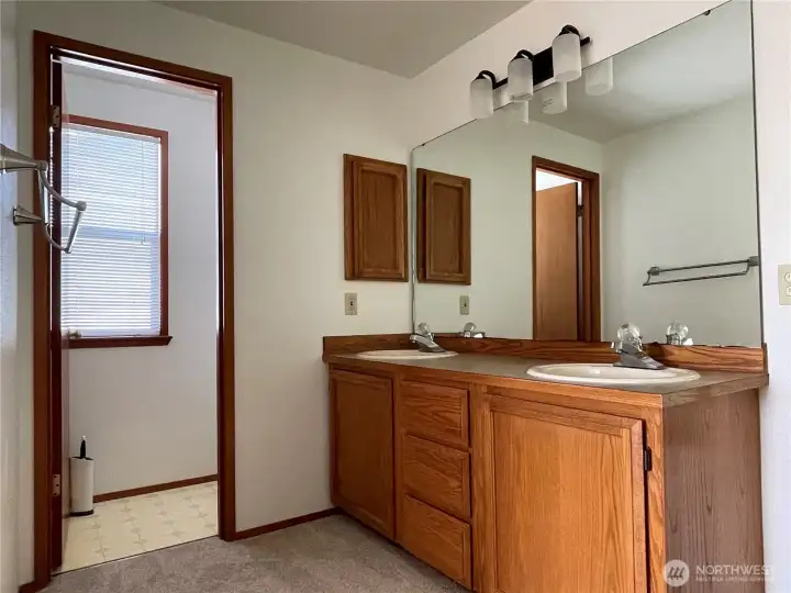 Primary Double Vanity/ Private Toilet