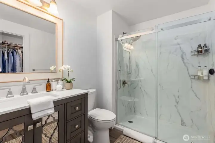 Primary full bath recently remodeled. *some decor is digitally staged