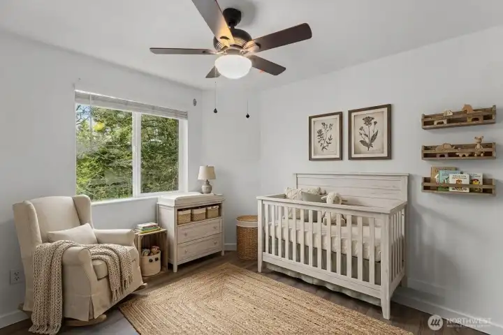 Bedroom #2, another option for design inspiration is a nursery. (decor digitally staged)