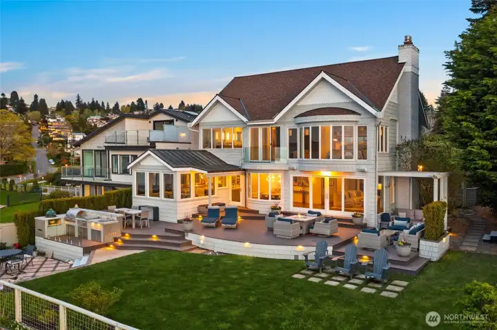 Exceptional waterfront home set against sweeping vistas of Puget Sound and the Olympic Mountains.