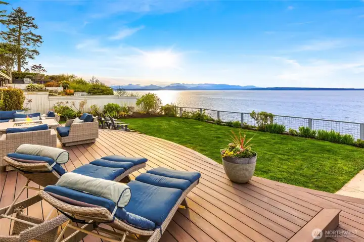 Expansive deck—perfect for entertaining—with a fully equipped outdoor kitchen, hot tub and front-row seats to some of the most peaceful, mesmerizing views.