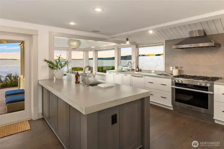 Beautiful custom kitchen with concrete counters, built-in coffee machine and more views!