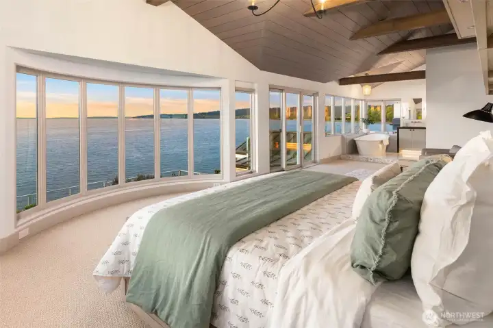 Primary suite is its own private sanctuary. Wake up to the sound of gentle waves and panoramic views.