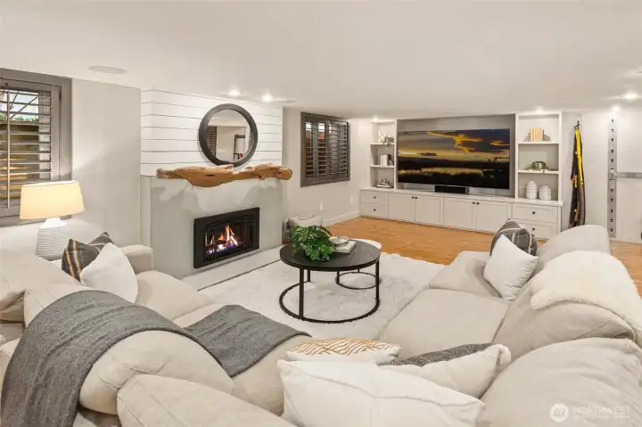 Lower level expands your options with a versatile space featuring a workout area, Murphy bed, media setup, and a spa-like steam shower bath—perfect for guests or downtime.