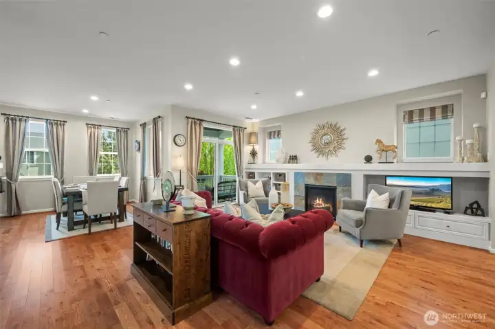 Upgraded lighting shows off the beautiful wood floors.