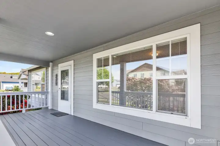 The covered front porch keeps you dry on rainy days and shaded when the sun is out, creating a perfect spot for rocking chair sitting and enjoying the neighborhood. Add a few flower pots to bring color and charm right to the entryway.