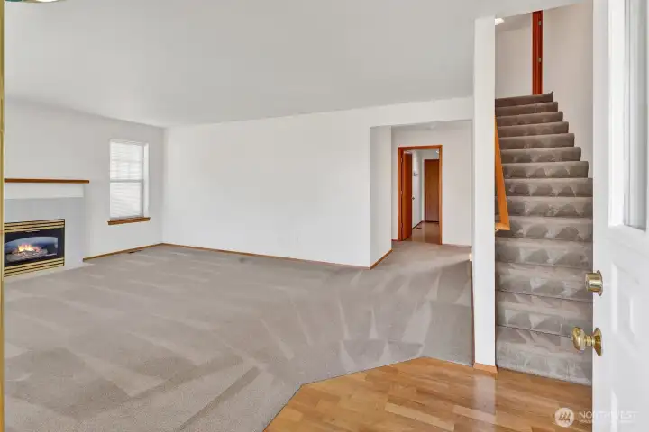 Step inside with the living room immediately to your left, offering a warm and inviting space to relax and gather. Upstairs, you’ll find a couple of well-sized bedrooms along with a full bath, providing a comfortable and private retreat away from the main living area.