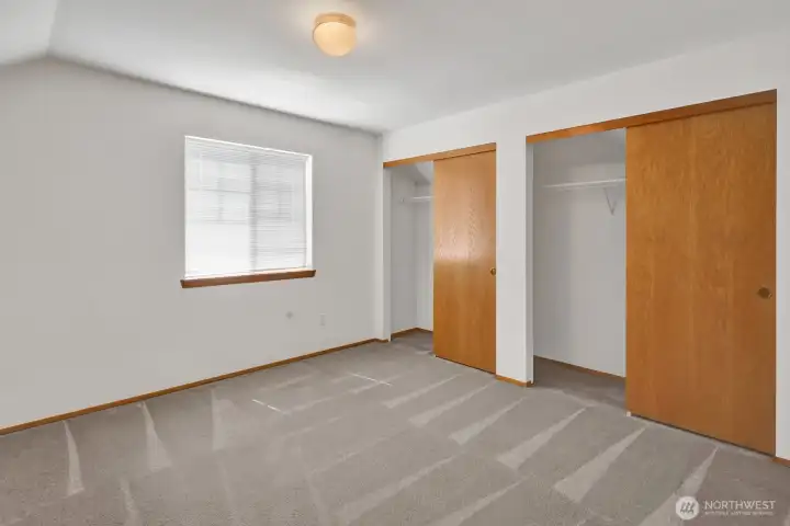 One of two upstairs bedrooms.