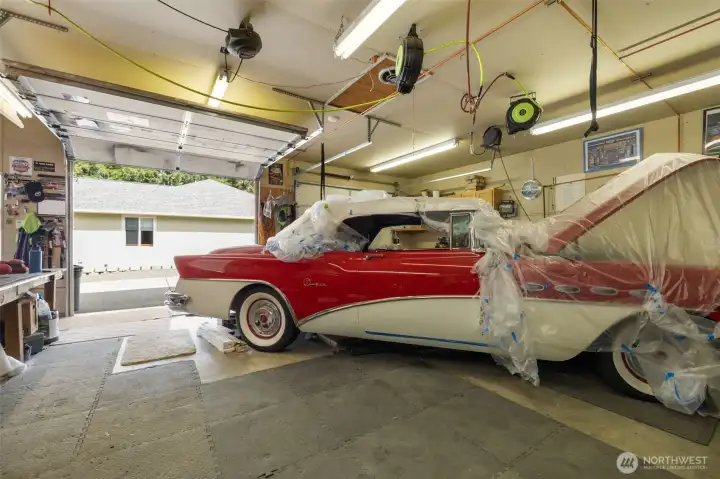 The kind of shop space buyers dream about, finished, heated, well lit, and ready for the projects, vehicles, tools, and creative work that never quite fit in an ordinary garage.