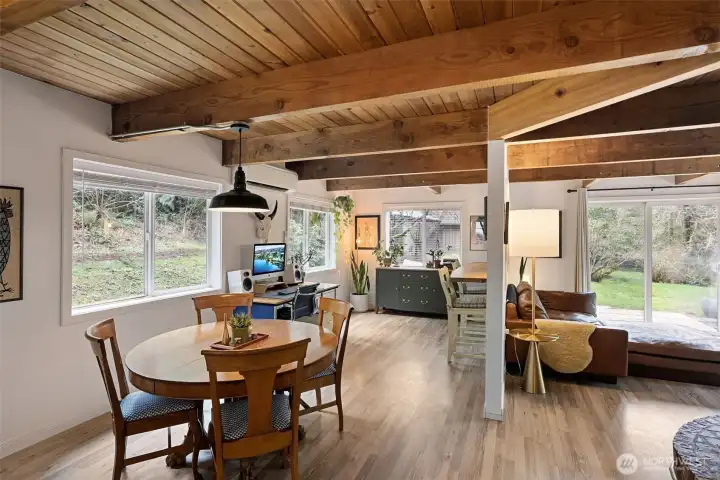 The main floor offers that open concept you've been looking for. Spaces for that intimate conversation while still being a part of the activities around you. The wood ceilings continue through the main floor warming up the space and giving it a homey feel. The main floor offers that open concept you've been looking for. Spaces for that intimate conversation while still being a part of the activities around you. The wood ceilings continue through the main floor warming up the space and giving it a homey feel.