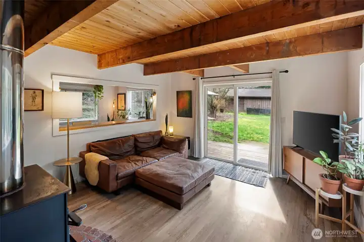 Another view of the living room looking out to the yard. The open concept makes the spaces feel large yet intimate at the same time. Another view of the living room looking out to the yard. The open concept makes the spaces feel large yet intimate at the same time.